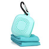 ActiveGear RO portable silicone case with carabiner and mini travel towel in turquoise color.